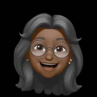 A smiling memoji with glasses and long, gray hair.