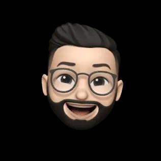 A memoji of a bearded person with glasses, short dark hair, and a big smile.